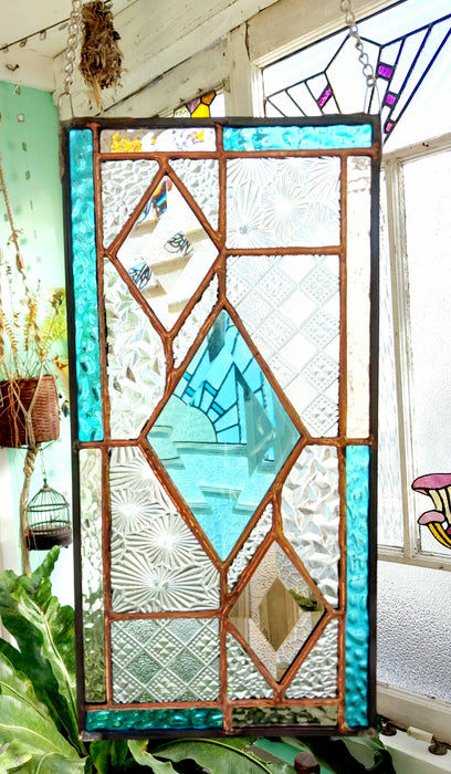 Patchwork with bevelled diamonds.