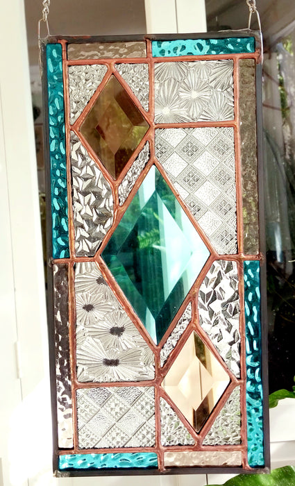 Patchwork with bevelled diamonds.